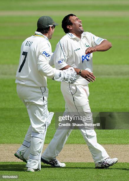 Samit Patel of Nottinghamshire celebrates with Chris Read after taking the wicket of Ben Stokes of Durham during the LV County Championship match...