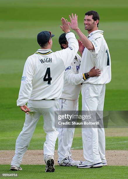 Charlie Shreck of Nottinghamshire celebrates after taking the wicket of Dale Benkenstein of Durham during the LV County Championship match between...