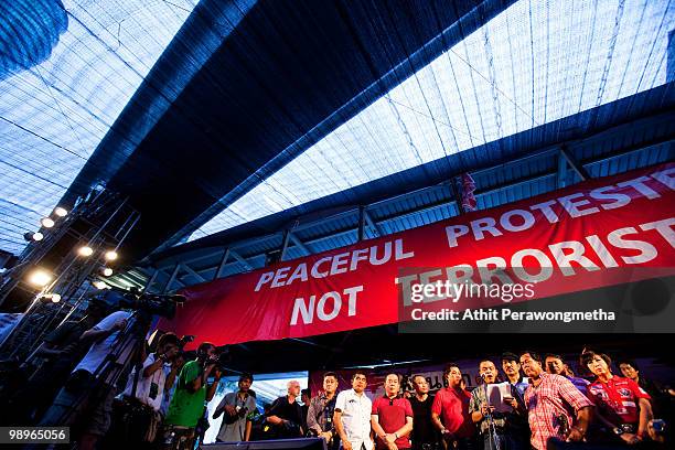 Anti-government protesters 'Red Shirt' leaders speak to their supporters inside their encampment on May 11, 2010 in Bangkok, Thailand.The Red Shirts...