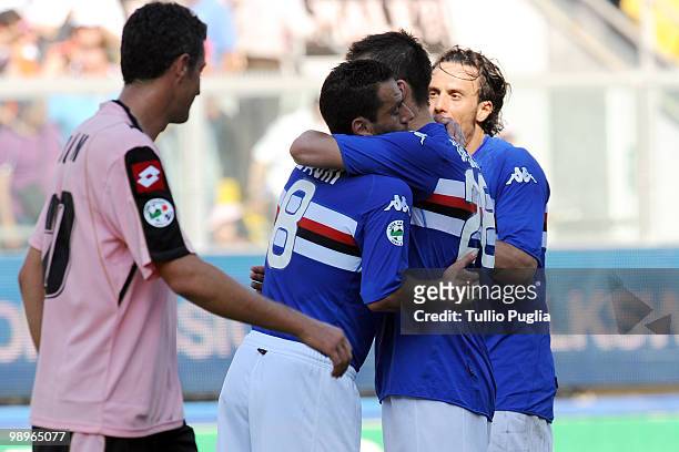 Players of Sampdoria celebrate as Igor Budan of Palermo looks on after the Serie A match between US Citta di Palermo and UC Sampdoria at Stadio Renzo...