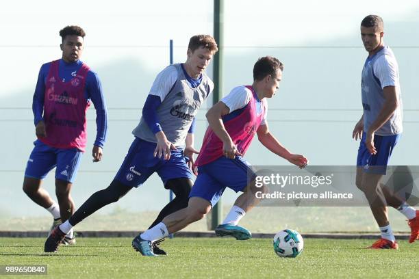 Schalke 04's Alexander Nebel engages in a duel with Yevhen Konoplyanka during a training session in Benidorm, Spain, 4 January 2018. The Bundesliga...