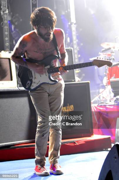 Simon Neil of Biffy Clyro performs on stage at Hammersmith Apollo on May 6, 2010 in London, England.