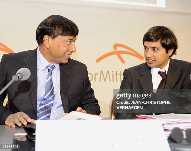 Chairman of the Board of Directors and CEO of ArcelorMittal Lakshmi Mittal sits beside his son and Chief Financial Officer of ArcelorMittal Aditya...