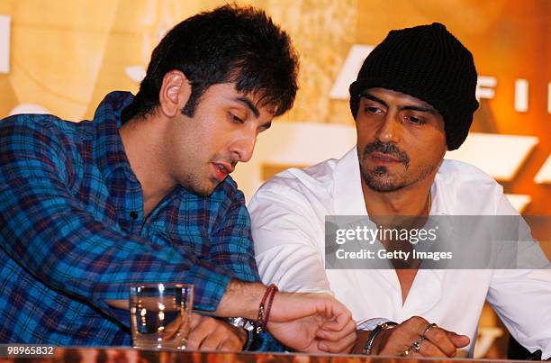 Bollywood actors Ranbir Kapoor and Arjun Rampal take part in a press conference for the movie 'Rajneeti' , on May 8, 2010 in Mumbai, India. 'Rajniti'...