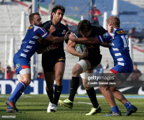 Javier Diaz of Jaguares is tackled by Jean-Luc du Plessis of Stormers during a match between Jaguares and Stormers as part of Super Rugby 2018 at...