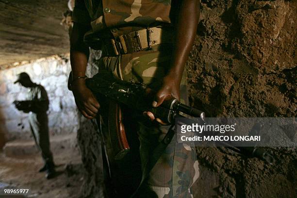 Ethiopian soldiers are seen on duty 20 November 2005 inside a trench dug on a hilltop overlooking the northern Ethiopian town of Badme, in the Tigray...