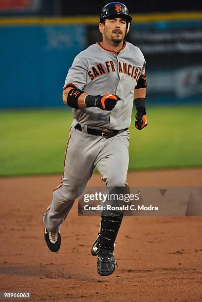 Aaron Rowand of the San Francisco Giants runs to third base during a MLB game against the Florida Marlins in Sun Life Stadium on May 6, 2010 in...