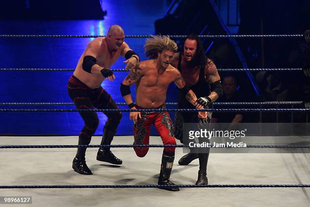 Wrestling fighters Kane , Edge and Undertaker fight during the WWE Smackdown Wrestling at Arena Monterrey on May 9, 2010 in Monterrey, Mexico.