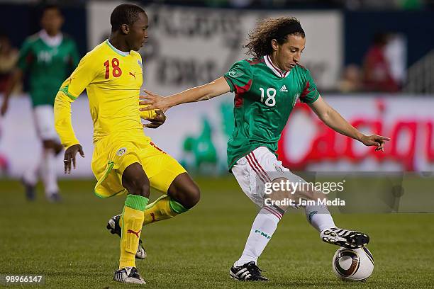 Andres Guardado of Mexico fights for the ball with Karamba Diallo of Senegal during an international friendly match as part of Mexico National Team -...