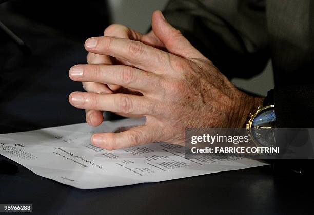 Hands of the coach of the Swiss football team, German Ottmar Hitzfeld gesture as he names the squad for the FIFA World Cup in South Africa during a...