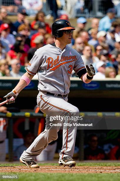 Matt Weiters of the Baltimore Orioles throws to second base against the Minnesota Twins at Target Field on May 9, 2010 in Minneapolis, Minnesota. The...