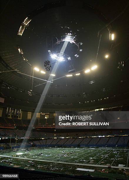 Shaft of light falls throught an opening in the fully evacuated Superdome 05 September 2005 in New Orleans, LA. The complete evacuation of New...
