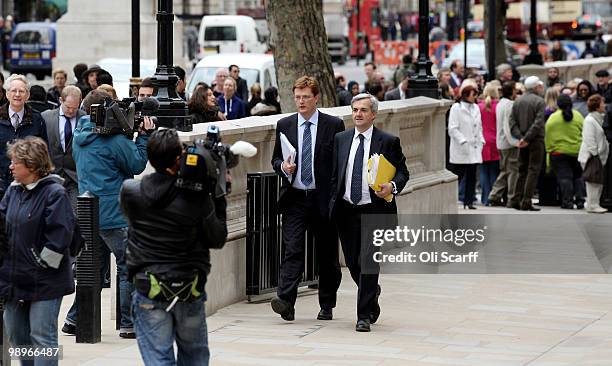 Liberal Democrats Shadow Home Secretary Chris Huhne , and Danny Alexander , Chair of the Liberal Democrats Manifesto Group, arrive at the Cabinet...