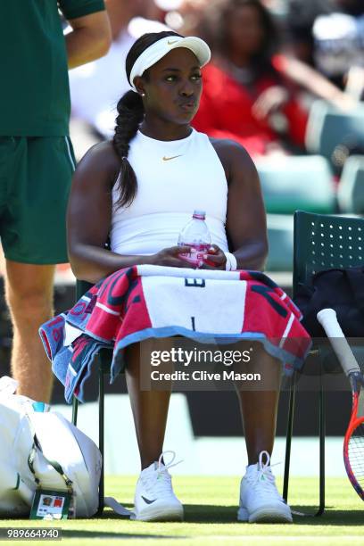 Sloane Stephens of the United States during a break in her Ladies' Singles first round match against Donna Vekic of Croatia on day one of the...