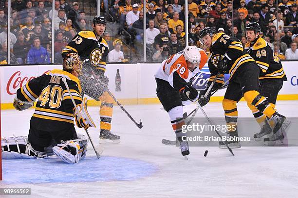 Darroll Powe of the Philadelphia Flyers trips on the ice against the Boston Bruins in Game Five of the Eastern Conference Semifinals during the 2010...
