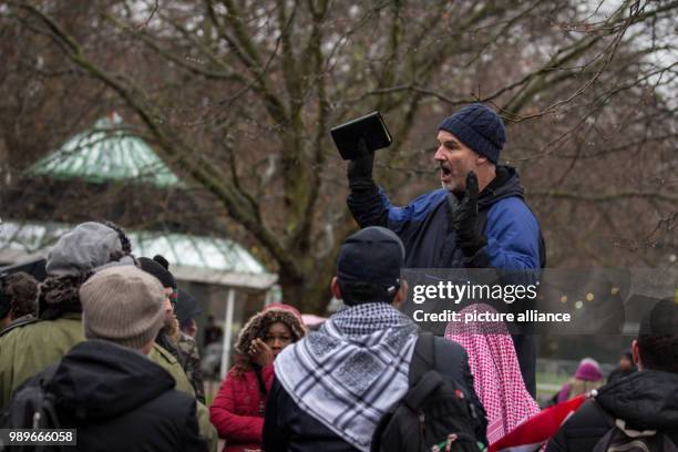 Dave , a Christian speaker, holds the bible in his hand as he speaks at Speakers' Corner in Hyde Park, London, Great Britain, 10 December 2017....