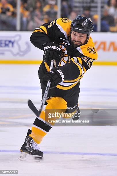 Mark Stuart of the Boston Bruins shoots the puck against the Philadelphia Flyers in Game Five of the Eastern Conference Semifinals during the 2010...