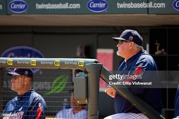 Manager Ron Gardenhire of the Minnesota Twins looks on from the dugout against the Baltimore Orioles at Target Field on May 9, 2010 in Minneapolis,...