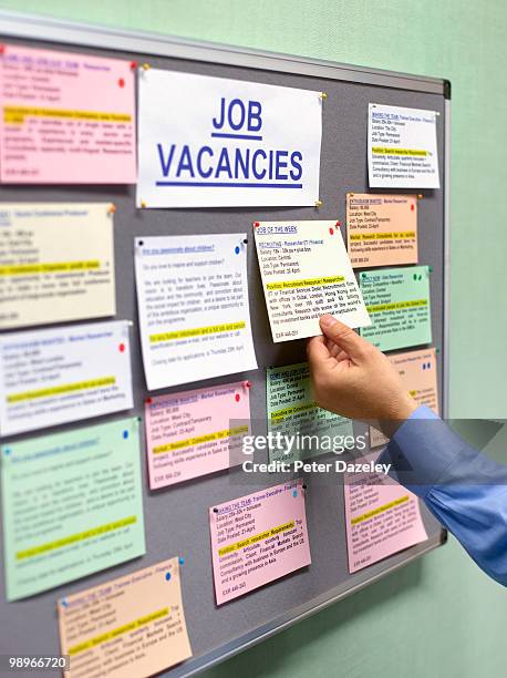 senior man at job vacancies board - employment agency stock pictures, royalty-free photos & images
