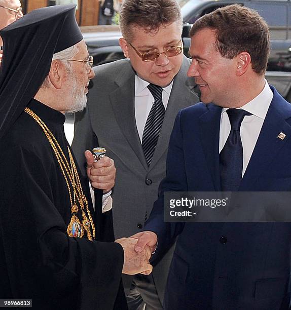 Russian President Dmitry Medvedev is welcomed by Orthodox Patriarch of Antioch and the whole East, Ignatius Hazim IV, in the old city of Damascus on...