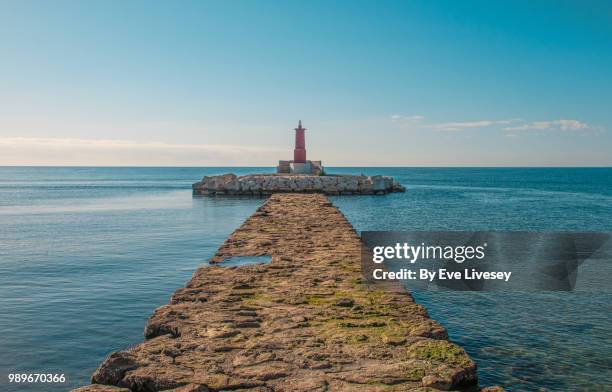 villajosa lighthouse - red beacon stock pictures, royalty-free photos & images