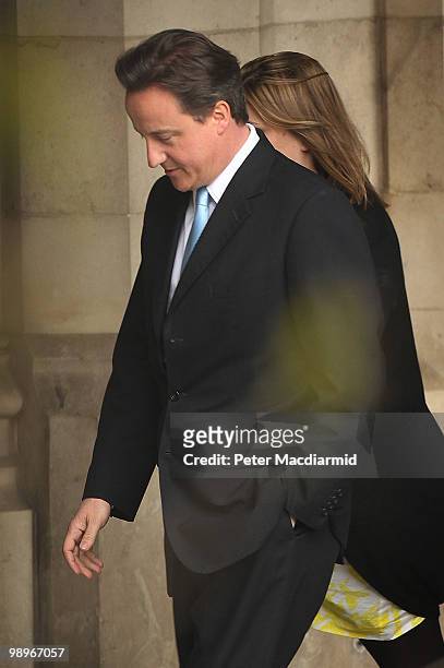 Conservative Party leader David Cameron walks to Portcullis House from Parliament with his press officer Liz Sugg on May 11, 2010 in London, England....