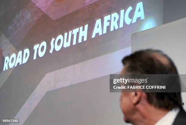 Coach of the Swiss football team German Ottmar Hitzfeld looks at a screen prior to naming the players for the FIFA World Cup in South Africa during a...