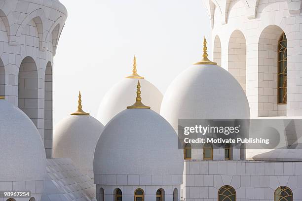 close-up view of sheikh zayed mosque's domes, abu dhabi, united arab emirates - sheikh zayed grand mosque stock pictures, royalty-free photos & images