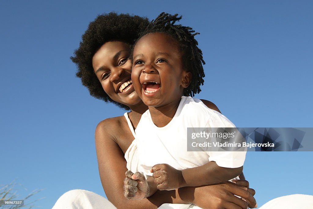 Laughing mother and daughter, Pringle Bay, Cape Town, Western Cape Province, South Africa