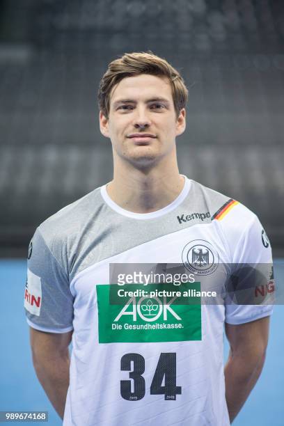 Rune Dahmke, player of the German handball national team, looks into the camera during a team's press conference in Stuttgart, Germany, 4 January...
