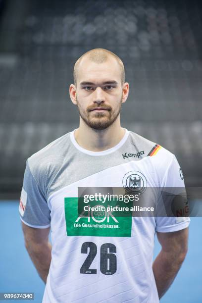 Maximilian Janke, player of the German handball national team, looks into the camera during a team's press conference in Stuttgart, Germany, 4...