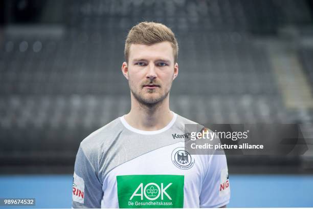 Philipp Weder, player of the German handball national team, looks into the camera during a team's press conference in Stuttgart, Germany, 4 January...