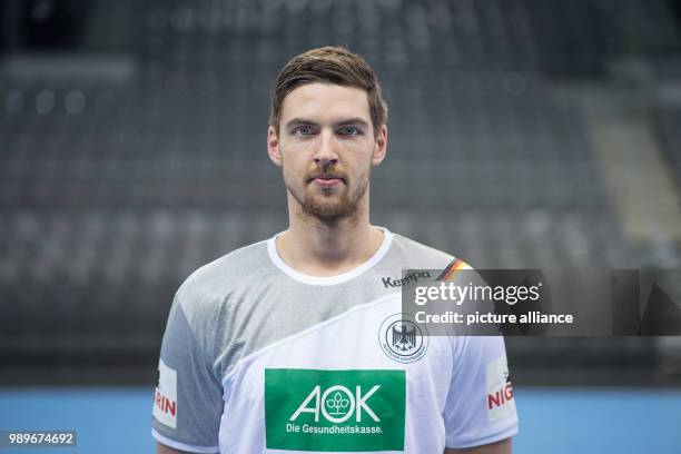 Hendrik Pekeler, player of the German handball national team, looks into the camera during a team's press conference in Stuttgart, Germany, 4 January...