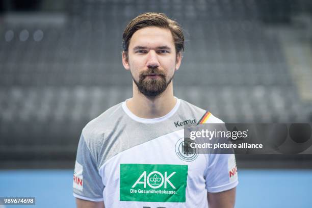 Fabian Wiede, player of the German handball national team, looks into the camera during a team's press conference in Stuttgart, Germany, 4 January...