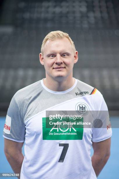 Patrick Wiencek, player of the German handball national team, looks into the camera during a team's press conference in Stuttgart, Germany, 4 January...