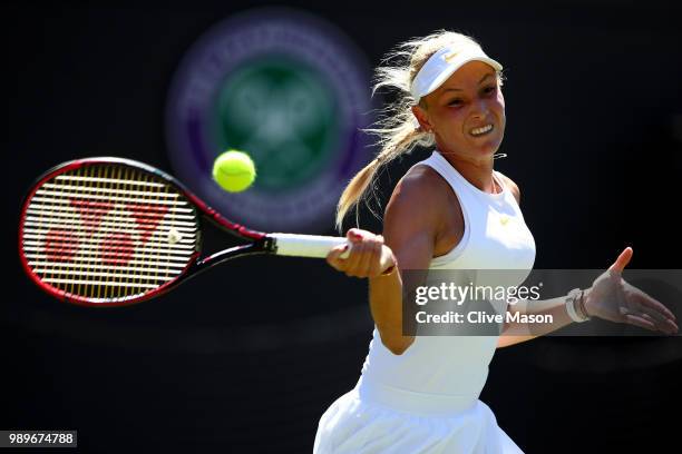 Donna Vekic of Croatia returns to Sloane Stephens of The United States during their Ladies' Singles first round match on day one of the Wimbledon...