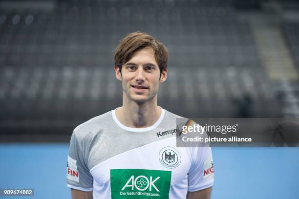 Uwe Gensheimer, player of the German handball national team, looks into the camera during a team's press conference in Stuttgart, Germany, 4 January...