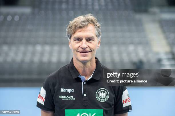 The physiotherapist of the German handball national team Peter Graeschus looks into the camera during a team's press conference in Stuttgart,...