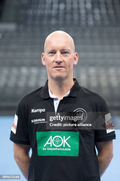 The physiotherapist of the German handball national team Dennis Finke looks into the camera during a team's press conference in Stuttgart, Germany, 4...