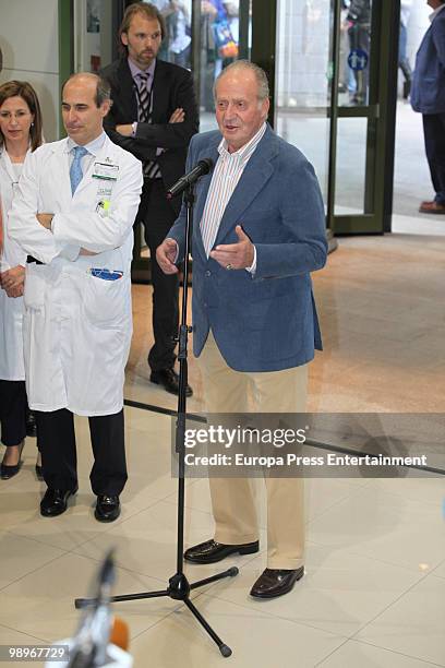 Spanish King Juan Carlos I is seen leaving the Clinic Hopital, four days after undergoing an operation to remove a nodule on his right lung on May...