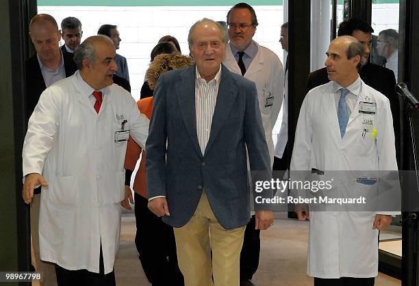 King Juan Carlos of Spain leaves the Clinic Hopital, four days after undergoing an operation to remove a nodule on his right lung on May 11, 2010 in...