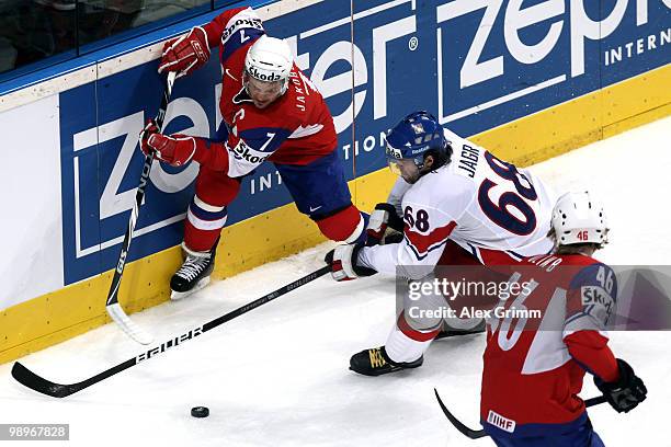 Jaromir Jagr of Czech Republic is challenged by Mathis Olimb and Tommy Jakobsen of Norway during the IIHF World Championship group C match between...