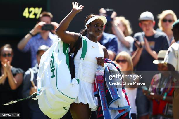 Sloane Stephens of the United States leaves the court after being defeated by Donna Vekic of Croatia during their Ladies' Singles first round match...