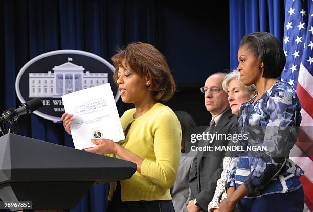 Domestic Policy Council Director Melody Barnes holds a copy of the Childhood Obesity Task Force report on May 11, 2010 during a press conference to...