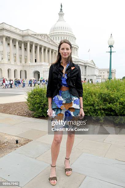 Christy Turlington poses for photographers after a news conference to introduce "The Outcomes while Maximizing Successes Act in front of the Capitol,...