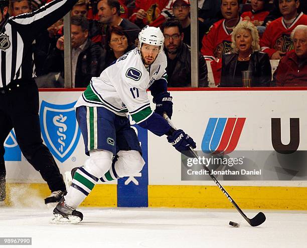 Ryan Kesler of the Vancouver Canucks looks to pass against the Chicago Blackhawks in Game Five of the Western Conference Semifinals during the 2010...