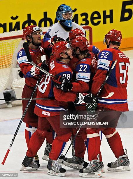 The Russians Alexander Ovechkin, Alexander Semin, Konstantin Korneyev and Viktor Kozlov celebrate scoring the thirs goal during the IIHF Ice Hockey...