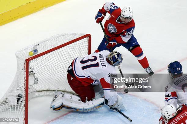 Mats Zuccarello Aasen of Norway tries to score against goalkeeper Ondrej Pavelec and Petr Gregorek of Czech Republic during the IIHF World...