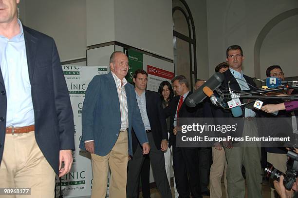 King Juan Carlos I of Spain is seen leaving the Clinic Hopital, four days after undergoing an operation to remove a nodule on his right lung on May...