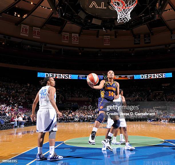 Tan White of the Connecticut Sun shoots the basketball against the New York Liberty during the preseason WNBA game on May 11, 2010 at the Madison...